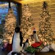 Winter holiday decoration with Christmas trees and penguins, created by ITG